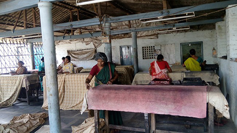 Kalamkari fabric being prepped for printing