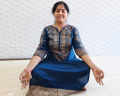 Malti Gupta doing yoga