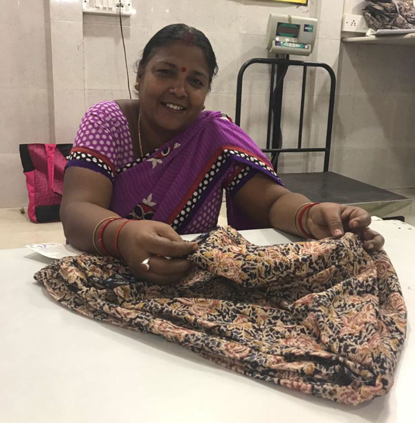 Pushpa embroidering